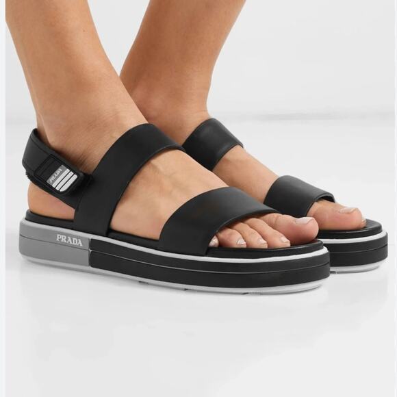 Prada Logo Embossed Rubber Trimmed Leather Sandals in Black - Picture 1 of 15